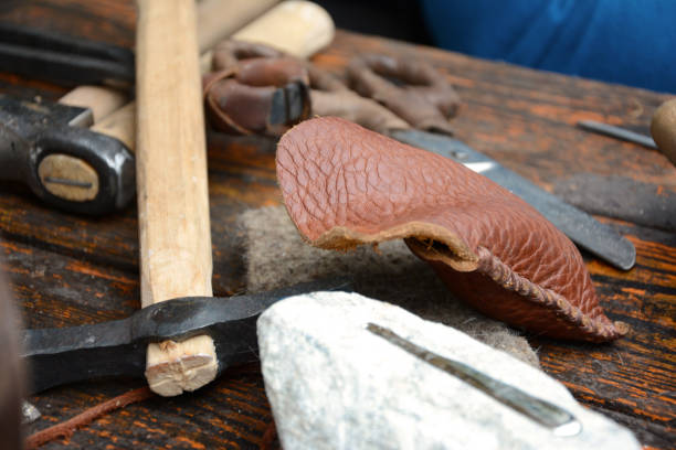 istock Antique tools on wooden boards 1290340265