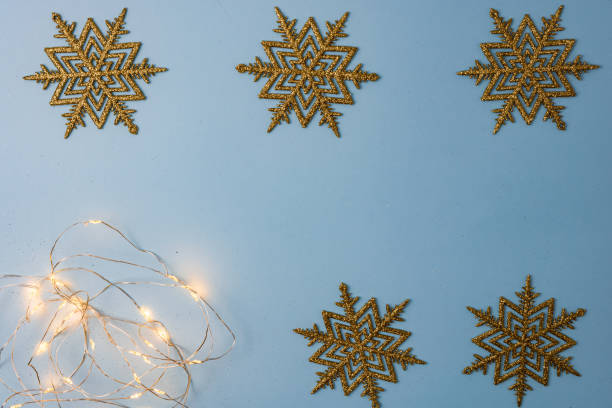 istock Decorated Christmas background with christmassy ornaments and decorations. Top view with copy space Christmas composition. 1290344194