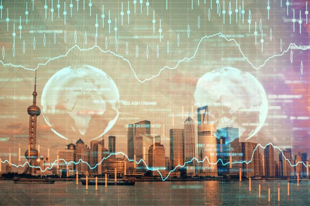 istock Forex graph on city view with skyscrapers background double exposure. Financial analysis concept. 1290348651