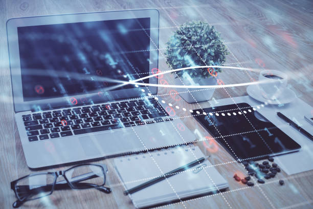 istock Forex market graph hologram and personal computer on background. Double exposure. Concept of investment. 1290349042