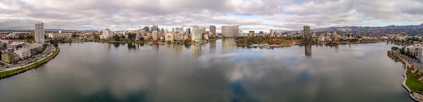 High Quality stock aerial photos of downtown Oakland with Lake Merritt in the foreground.