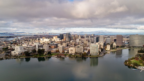 High Quality stock aerial photos of downtown Oakland with Lake Merritt in the foreground.