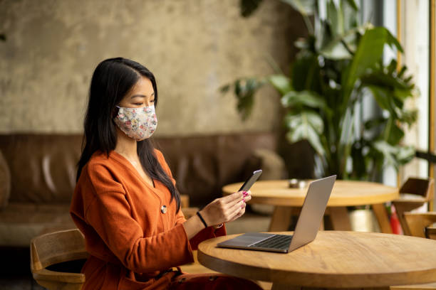 istock Beautiful Asian woman looking for work online 1290354954