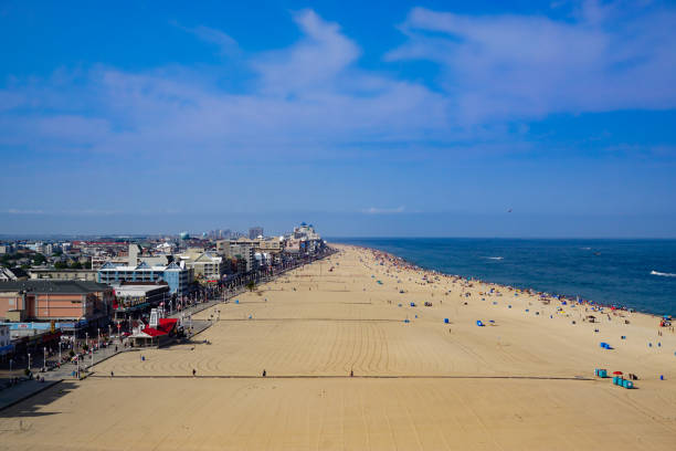 istock Elevated view across beach, boardwalk, and ocean 1290355276