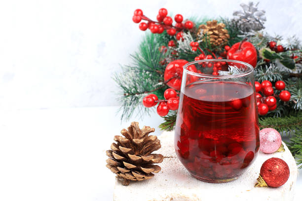 istock Strong alcoholic or non-alcoholic cranberry and cinnamon spiced cocktail, warming winter drink in the cold season, christmas festive grog, winter composition, 1290356236