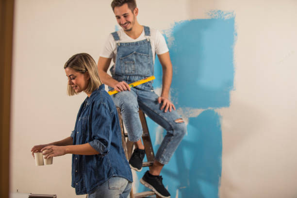 istock Couple about to enjoy coffee and take a break while renovating their apartment 1290356584