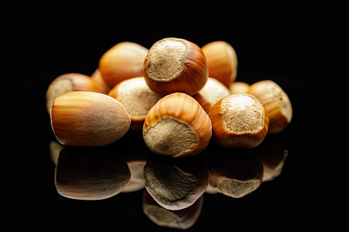 hazelnuts isolated on a black background