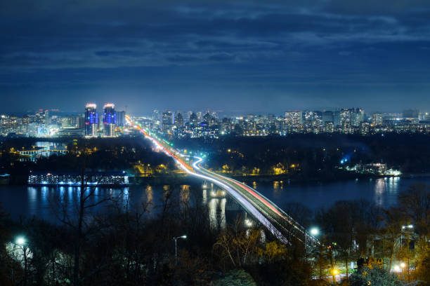 istock Metro bridge across the Dnieper river in Kyiv at night 1290360956