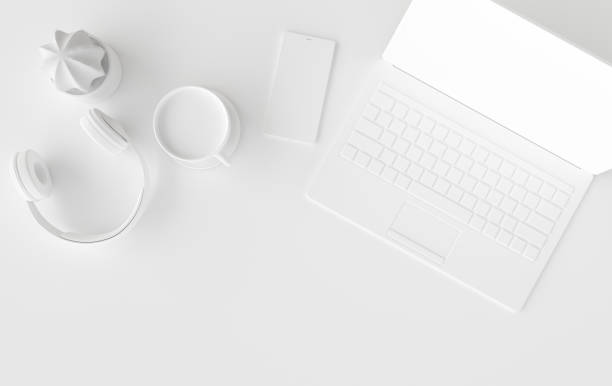 istock Laptop, phone, headphones, cup of coffee 3d rendering. Remote work, freelance, work space, lockdown, stay at home concept. Top view, white color 1290369656