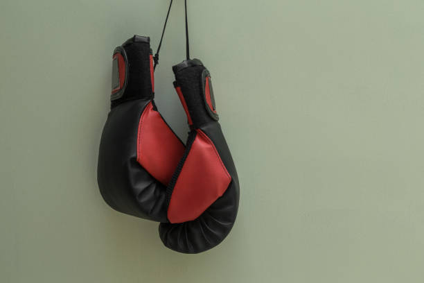 istock boxing gloves hanging close up 1290381561