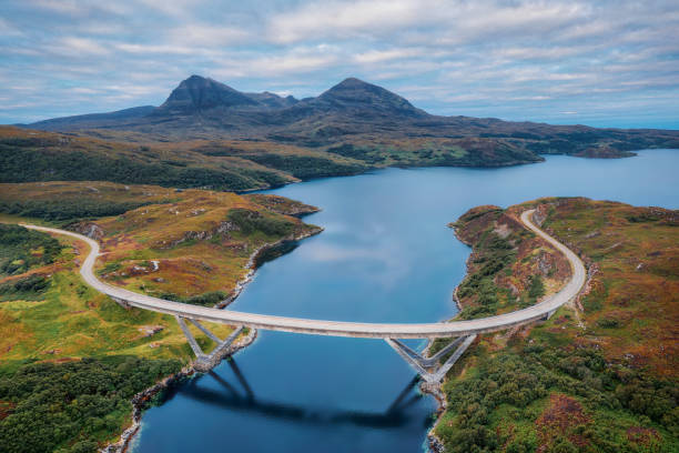 Kylesku Bridge along the NC500 in Northern Scotland, taken in August 2020 Kylesku Bridge along the NC500 in Northern Scotland, taken in August 2020, post processed using exposure bracketing north coast 500 stock pictures, royalty-free photos & images