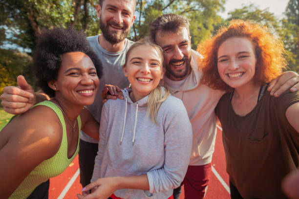istock Smiling sportsfolks 1290391506