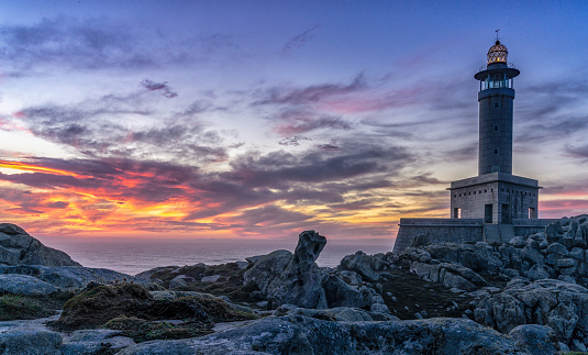 A panorama view of the Punta Nariga Lighthouse at sunset