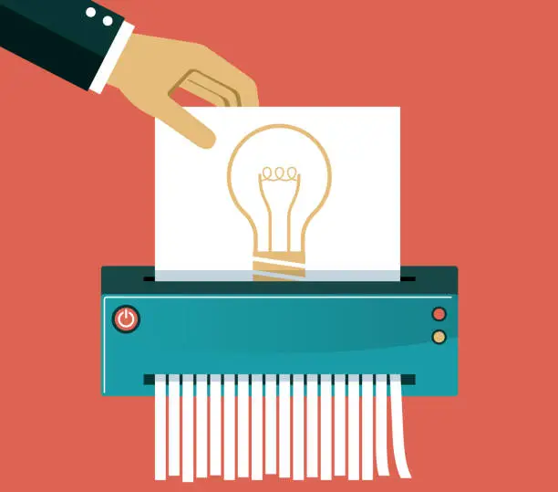 Vector illustration of Big hand inserts a paper with an idea light bulb