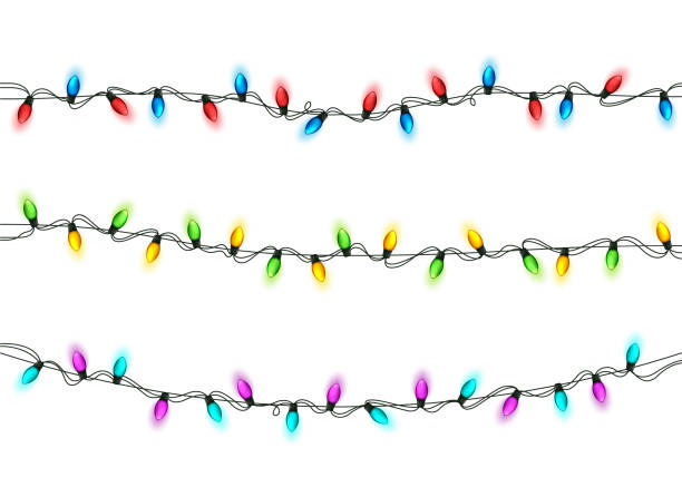 istock Christmas Festive Lights. Decorative Glowing Garland Isolated on White Background. Shiny Colorful Decoration for Christmas and New Year Holidays 1290397773