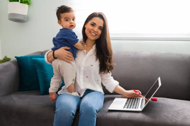 istock Single mom balancing work and a new baby 1290398580