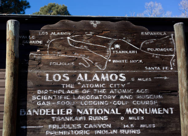Los Alamos, NM: Vintage 1950s Wooden Tourist Information Sign Los Alamos, NM: Vintage 1950s wooden tourist information sign in downtown Los Alamos, a town made famous as the 1940s home of the Manhattan Project. los alamos new mexico stock pictures, royalty-free photos & images