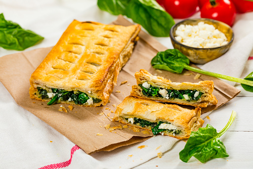 Traditional greek meal: spinach pie, fava beans and green salad.