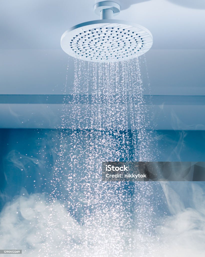 contrast shower with flowing water stream and hot steam Shower Stock Photo