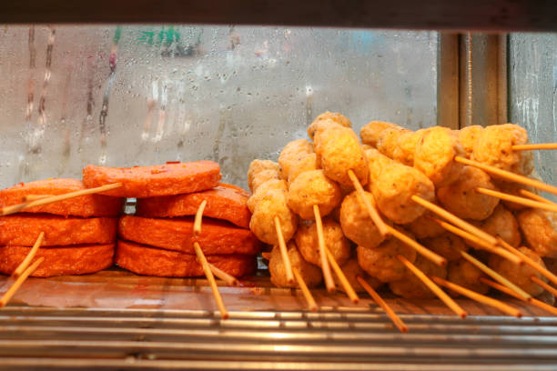 istock Grilled chicken and chicken lollypops inside the glass made box 1290413033