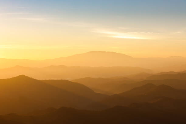 Mountain ridge silhouette in morning.