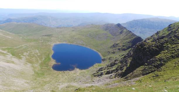 View of the lake View of the lake from Helvellyn striding edge stock pictures, royalty-free photos & images