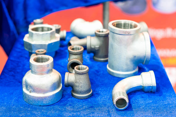 istock metal pipe connector conduit such as thread socket union fitting elbow flexible 3 way etc for plumbing sanitary or electric wiring pipe work high pressure air hose on table 1290428686