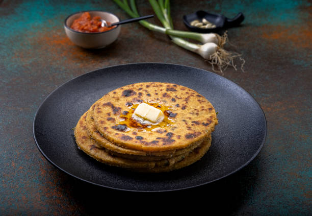 istock potato corn flour flat bread with onion garlic dip 1290445816