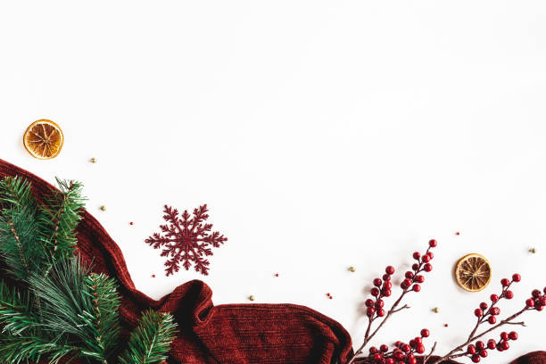 istock Christmas composition. Plaid, fir tree branch, red decorations on white background. Christmas, winter, new year concept. Flat lay, top view, copy space 1290445833