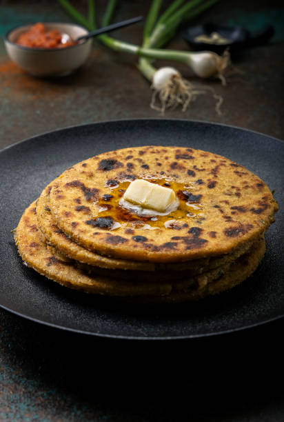 istock potato corn flour flat bread with onion garlic dip 1290446599