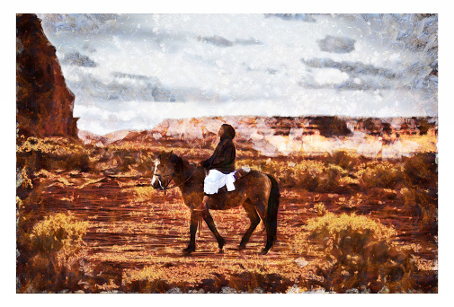 Navajo girl on horse in Monument Valley Arizona USA