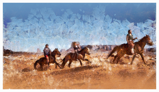 Navajo siblings galloping in Monument Valley Arizona USA