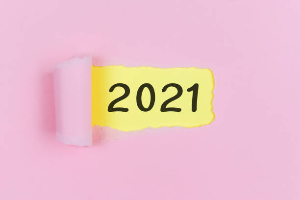 istock 2021 number on torn paper - business concept 1290447528