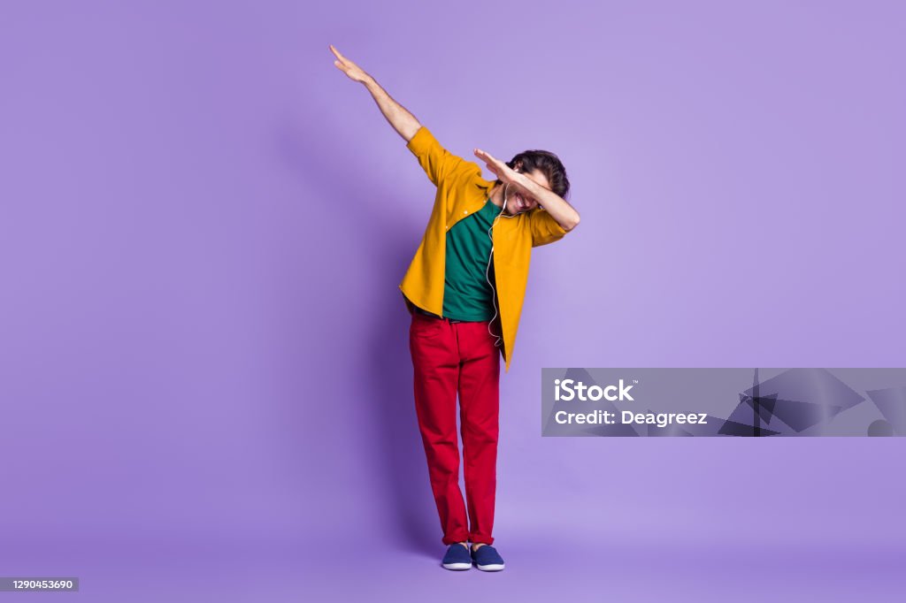 Photo portrait full body view of guy dabbing isolated on vivid purple colored background Photo portrait full body view of guy dabbing isolated on vivid purple colored background. Dab - Dance Stock Photo