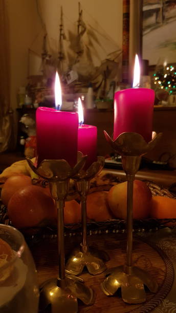 istock Flaming candles in antique brass candelabra 1290453792