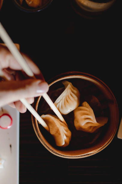 Close-up copy space with traditional steamed Chinese dumplings plate
