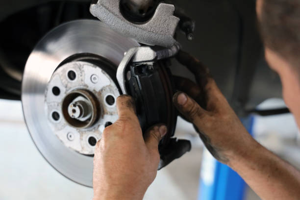Brake pad replacement in car service