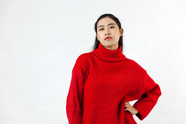 istock Asia woman over isolated background looking camera on white blackground 1290458565