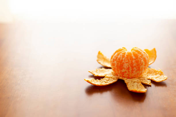 Tea and peeled oranges placed on the kotatsu