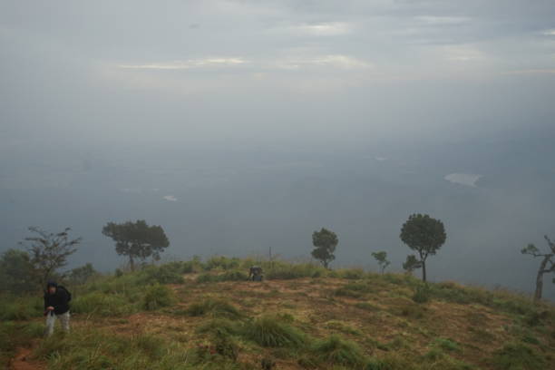istock Natural landscape view of green mountain range with cloudy blue sky 1290466899
