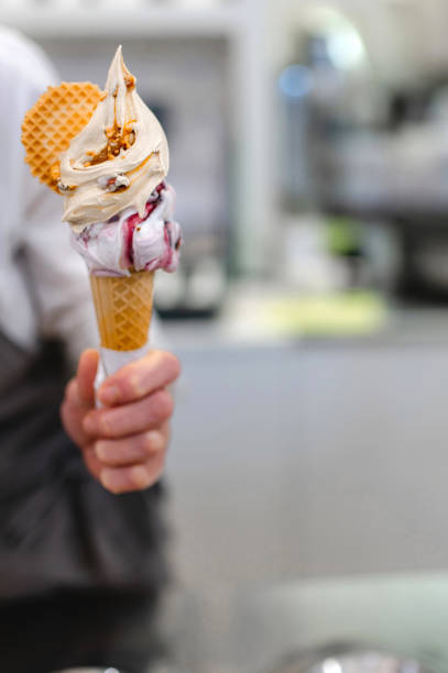 istock close-up unrecognizable woman preparing a creamy ice-cream. 1290468052