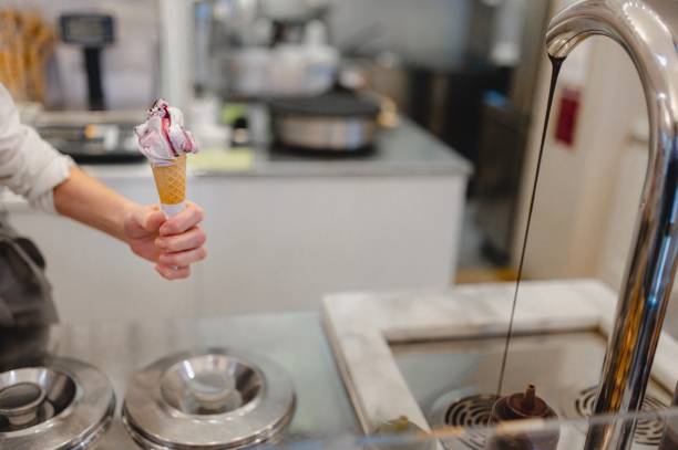 istock close-up unrecognizable woman preparing a creamy ice-cream. 1290468095