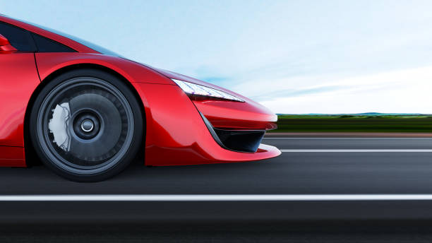 istock red sportscar driving on a road 1290469466