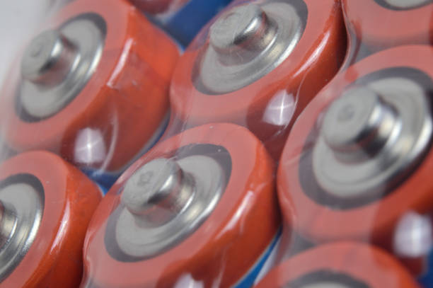 istock Electric batteries and accumulators of AAA AA standard size. close-up. 1290469836