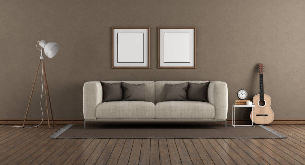 istock Minimalist living room with brown wall and modern sofa 1290472529