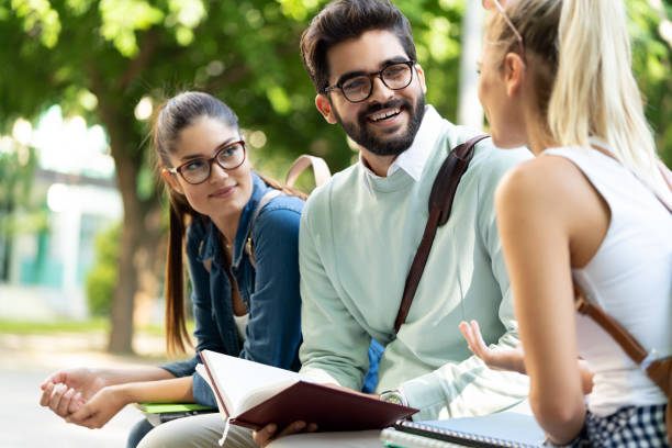 istock College students studying on university campus outdoor 1290474496