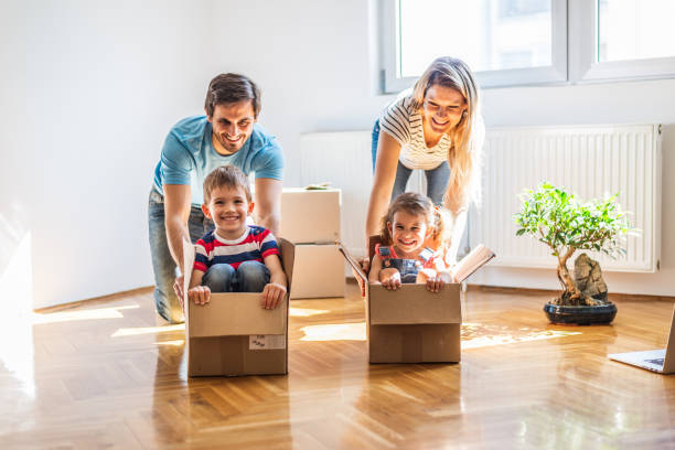 istock Family race into new home 1290474965