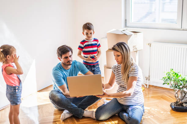 istock Family moving into new home 1290475129