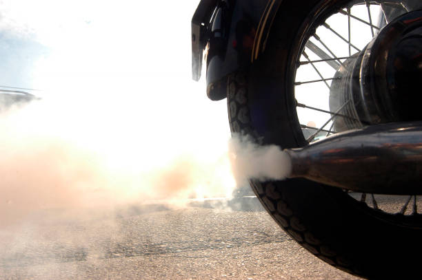 istock Air pollution caused by motorcycle exhaust gas 1290477256