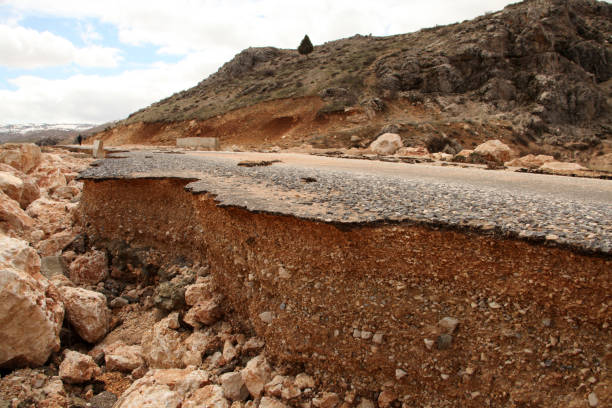 istock Damaged mountain asphalt road. Country road. 1290479896